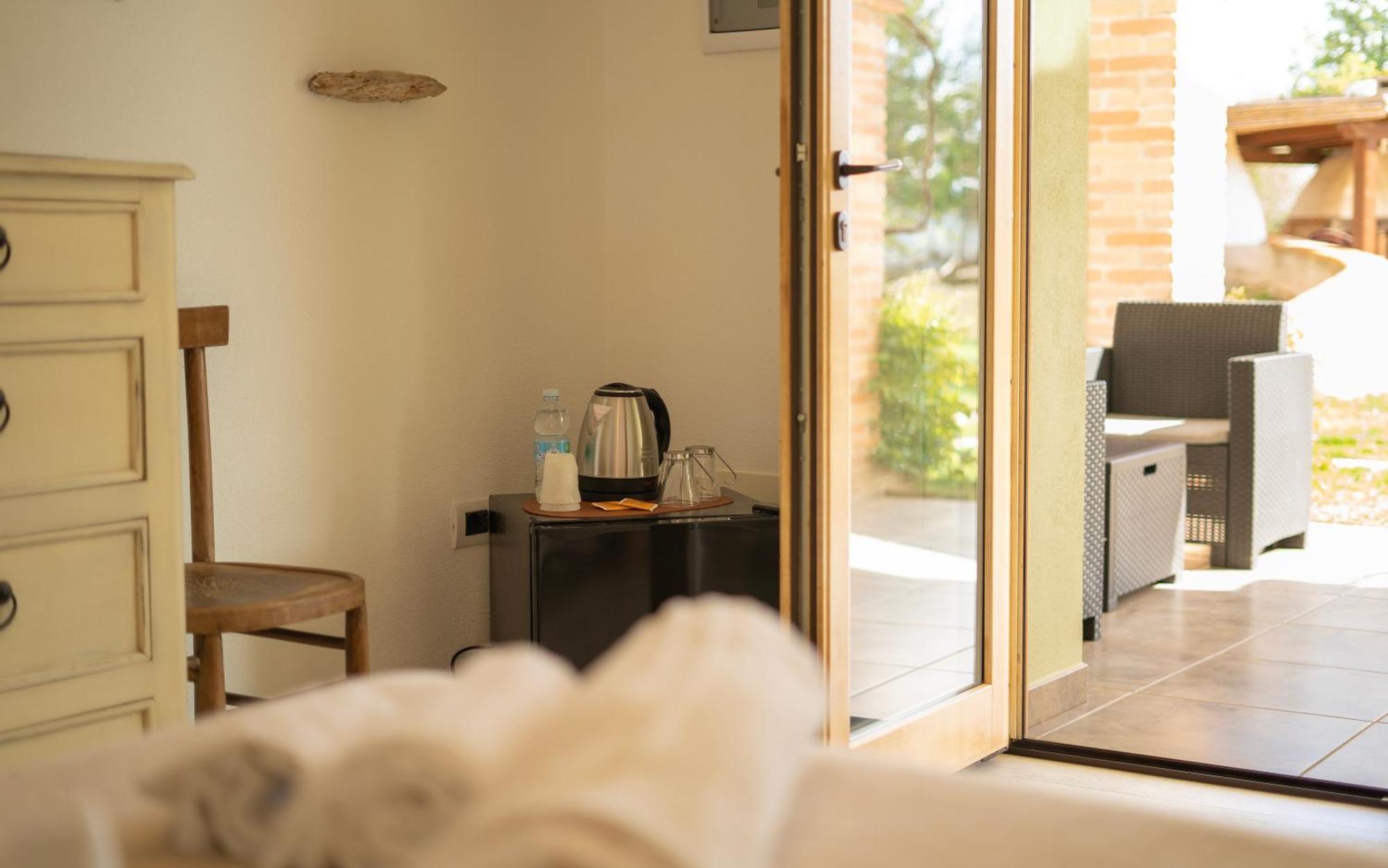 Hotel Essenza Di Mirto La Caletta Pokój zdjęcie