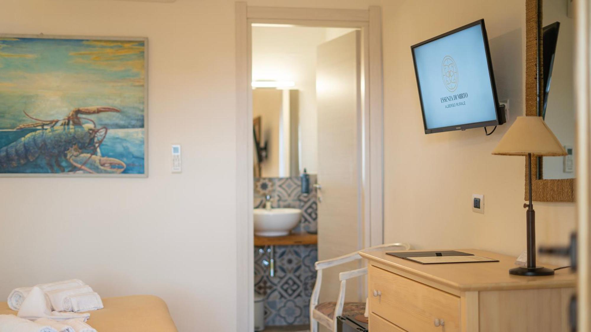 Hotel Essenza Di Mirto La Caletta Pokój zdjęcie