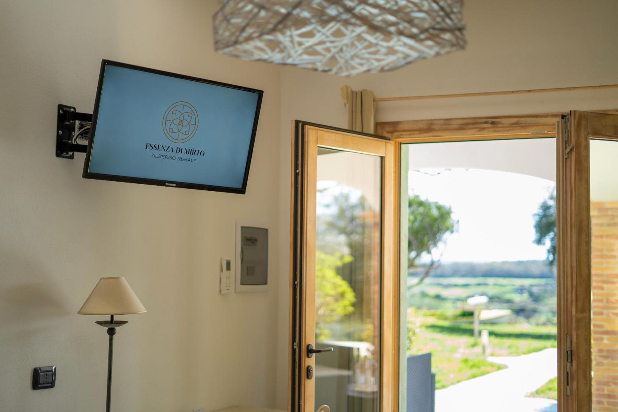 Hotel Essenza Di Mirto La Caletta Pokój zdjęcie